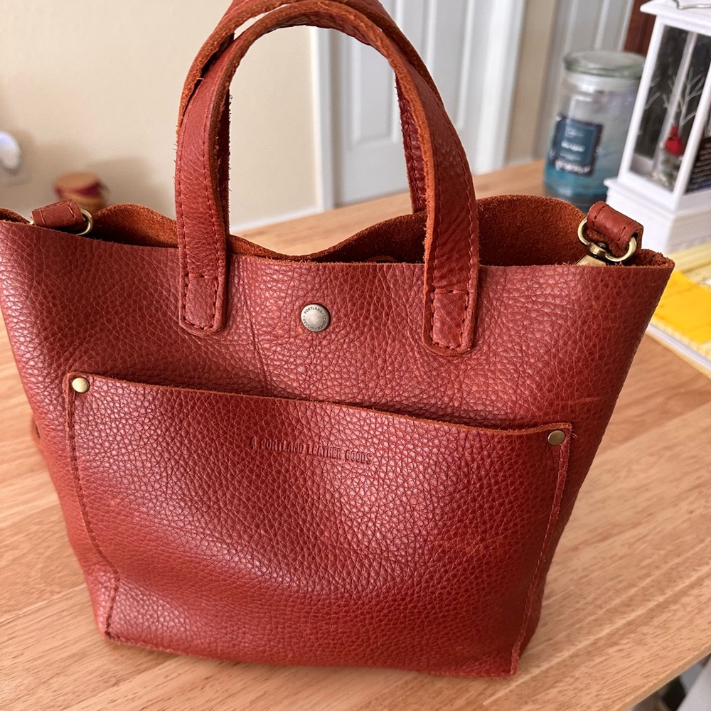 Portland leather mini crossbody pebbled nutmeg bag.